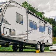 Camco Camper/RV Curved Trailer Aid | Features 6.5" of Lift & Includes Wheel Chock and Rubber Base Pad | Designed for Trailers Up to 20,000lbs & Compatible w/ Tires Up to 32" (44436)