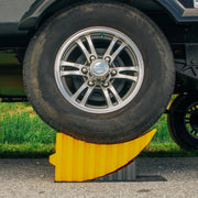 Camco Camper/RV Curved Trailer Aid | Features 6.5" of Lift & Includes Wheel Chock and Rubber Base Pad | Designed for Trailers Up to 20,000lbs & Compatible w/ Tires Up to 32" (44436)